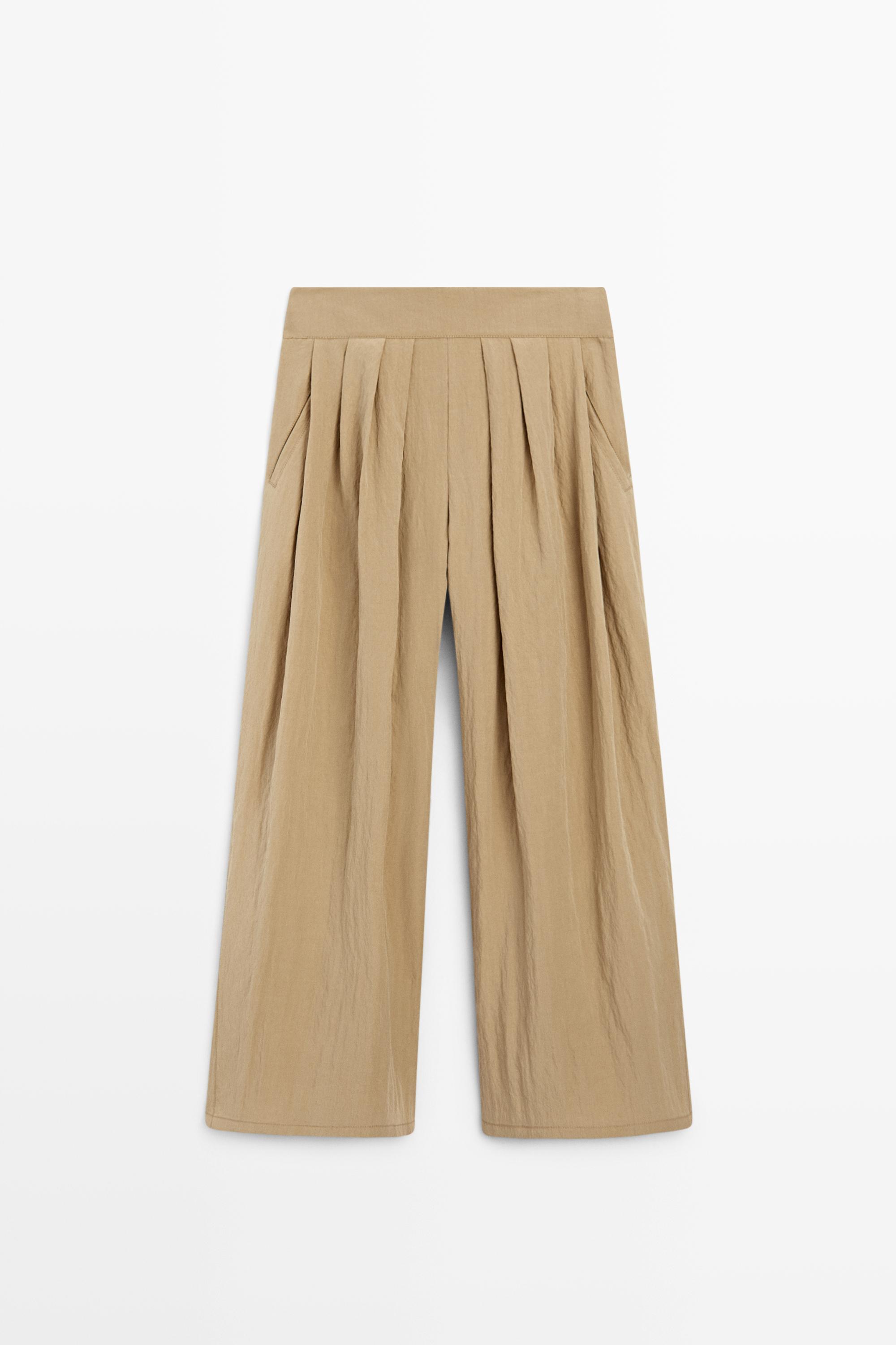 Palazzo trousers with box pleats